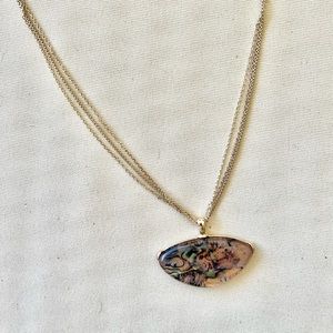 Target gold necklace with multicolored stone